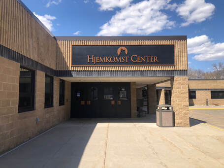 A photo of the front entrance of the Hjemkomst Center in Moorhead, Minnesota.