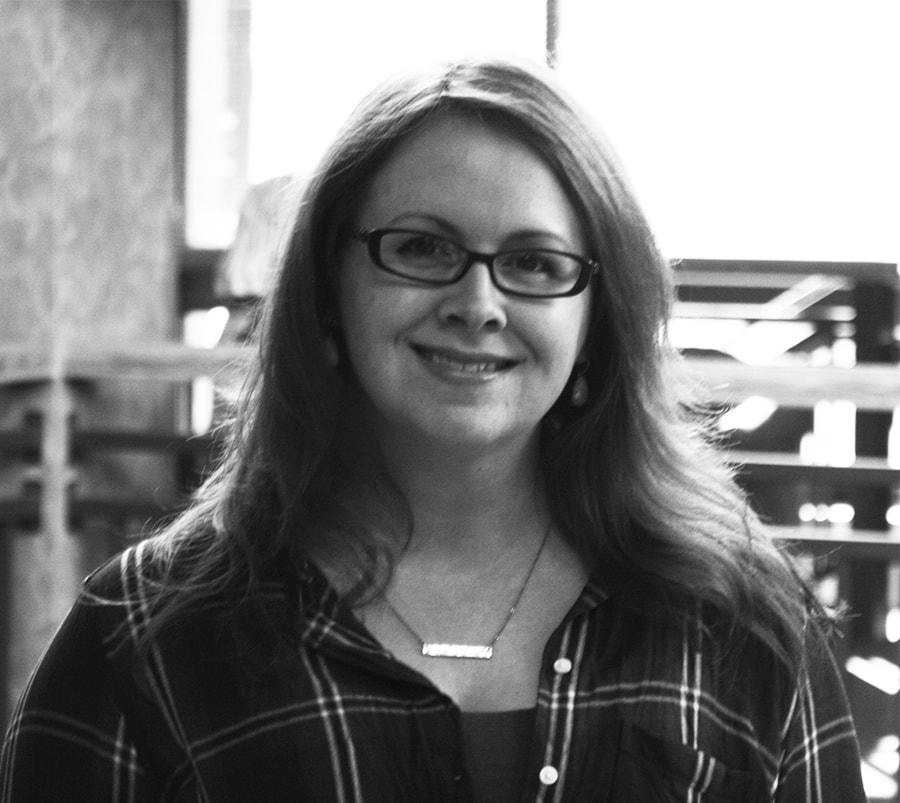 Image: a grayscale photograph of HCSCC collections manager Lisa Vedaa.
